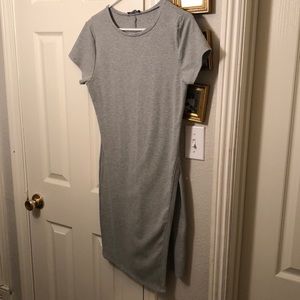 Gray asymmetrical body con dress